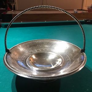 Silver “basket-style” footed serving tray has a movable handle w/beaded design